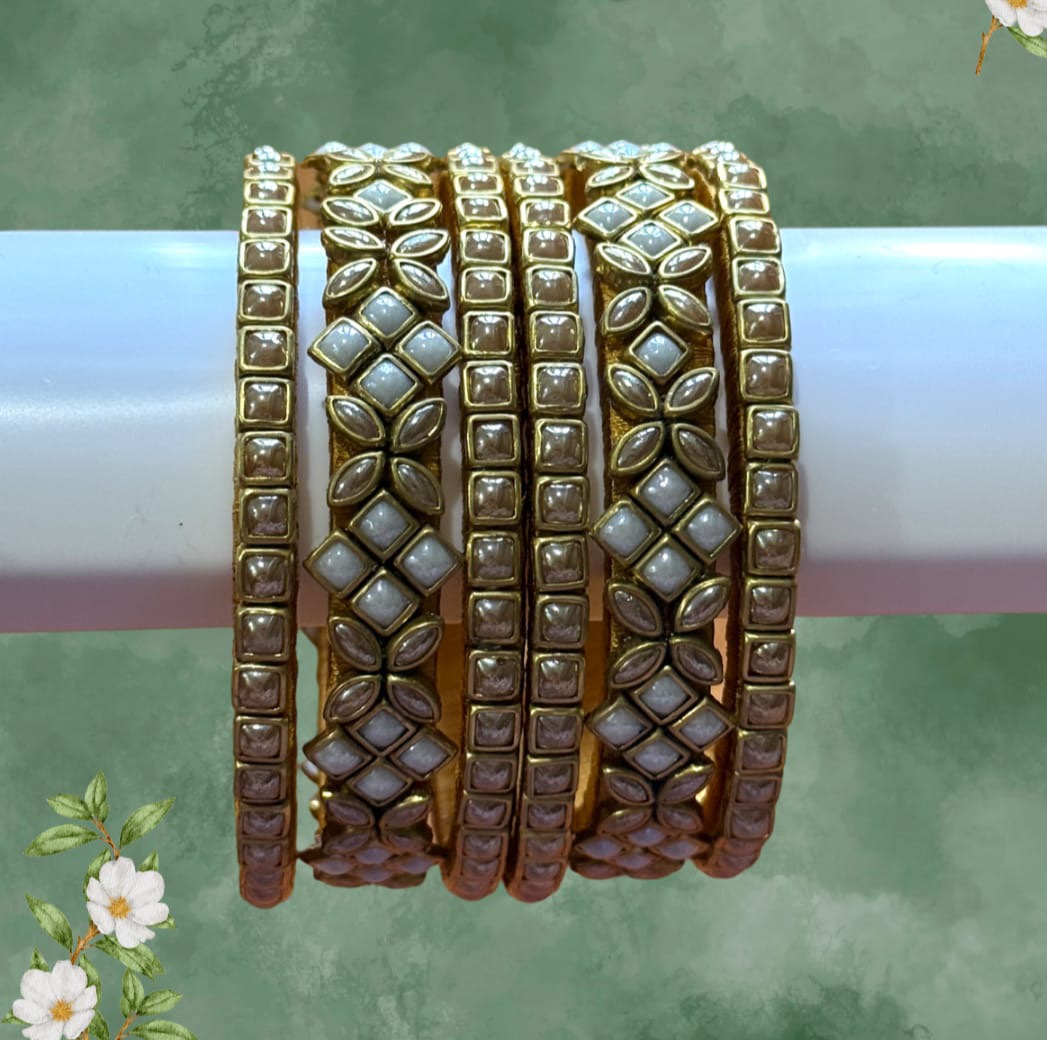 Gold and pearl bangles